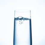 water glass on blue background