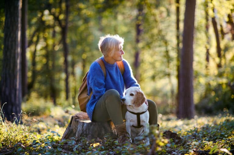 Image of a senior woman outdoors. COPD treatment allows older adults to live more abundant happy lives.