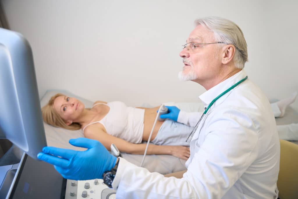 A senior woman gets an ultrasound.