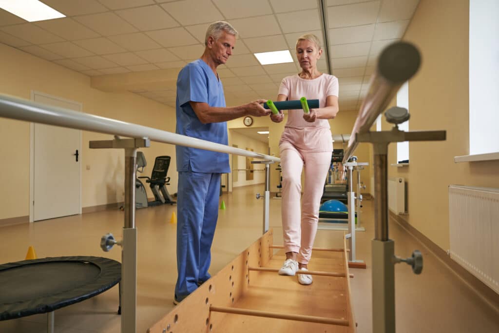 Backward disequilibrium: a female patient participates in balance-based physical therapy