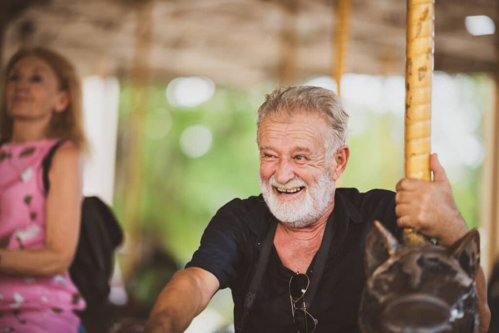 Hearing and Balance: image of a senior man on a carousel