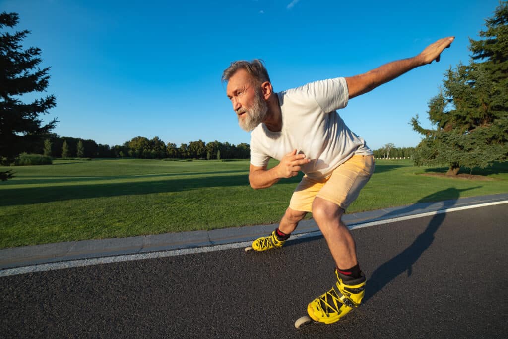 How to Make a Physical Therapy Appointment: image of a senior man rollerblading